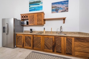 Apartment, Garden View | Private kitchen | Coffee/tea maker, dining tables