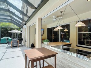 Outdoor dining - Classic Arcades Heated Pool Home by Beach & Dining (Bonita Springs)