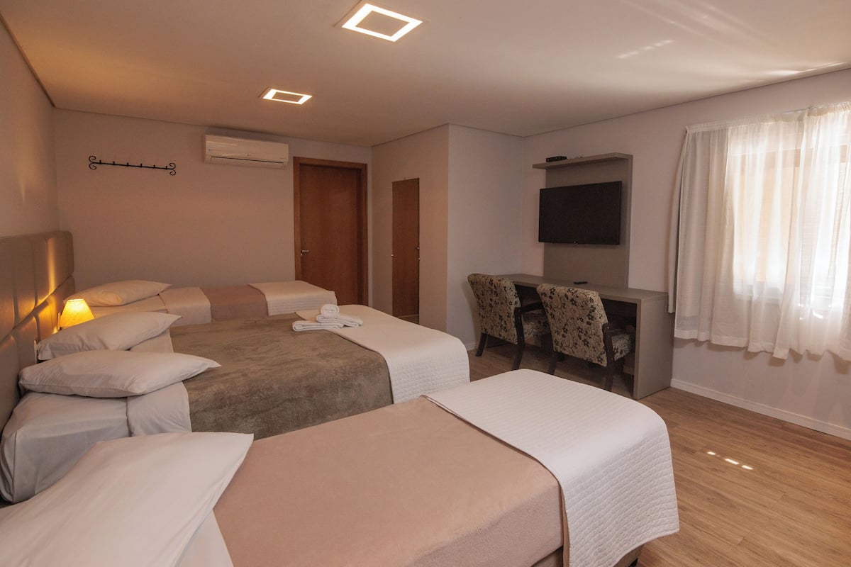 Standard Quadruple Room | Laptop workspace, free WiFi