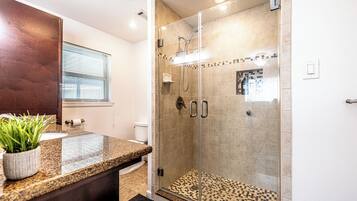 Shower, hair dryer, towels, soap