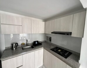 Fridge, stovetop, cookware/dishes/utensils