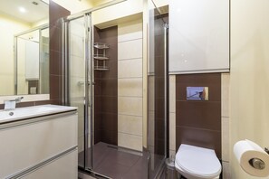 Shower, free toiletries, hair dryer, towels