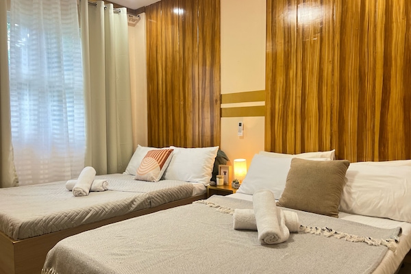 Basic Quadruple Room, 2 Katil Kelamin (Double), Private Bathroom, Garden View | Kalis bunyi, Wi-fi percuma