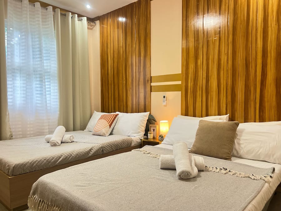 Basic Quadruple Room, 2 Double Beds, Private Bathroom, Garden View | Soundproofing, free WiFi