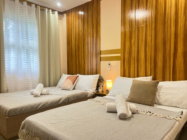 Chambre Quadruple, 2 lits doubles, salle de bains privée, vue jardin