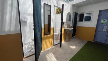 Shower, towels, soap, shampoo