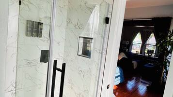 Shower, hair dryer, towels, soap