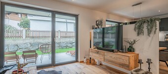 Appartement moderne avec sauna et jardin