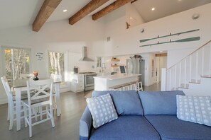 A modern kitchen with white cabinetry, a stainless steel range, and a built-in oven. - Waterfront Roque Bluffs Hideaway w/ Private Beach (Roque Bluffs)