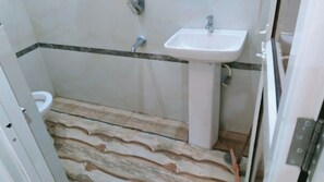 Dusch, regndusch, handdukar och tvål