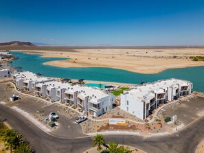 Enjoy scenic views of the adjacent water from your balcony.