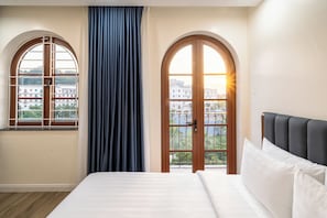 Family Quadruple Room | Premium bedding, in-room safe, desk, blackout drapes - Anston Castle Hotel (Phu Quoc)