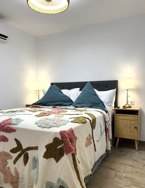 1 bedroom, desk, iron/ironing board, travel cot