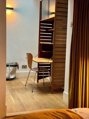 1 bedroom, desk, iron/ironing board, travel crib