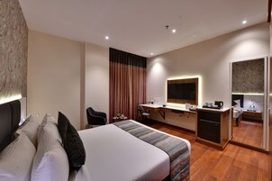 Ropa de cama de alta calidad, colchones con efecto memoria y minibar