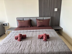 Superior Condo, Ocean View | In-room safe, desk, laptop workspace, blackout drapes