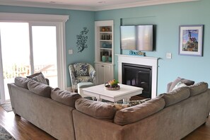 Télévision, cheminée, baby-foot