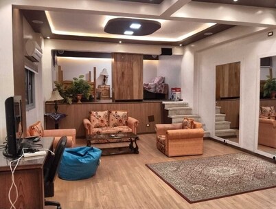 Cozy 1-bedroom condo in peaceful Giza with WiFi, AC, Sound & Light systems.