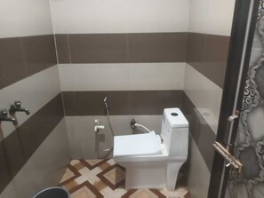 Deluxe Double Room, Balcony, City View | Bathroom | Shower, towels, soap, toilet paper