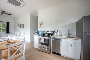 Fridge, microwave, oven, stovetop - Brand New Stylish Apartment, Pool and Beach Access, Short Walk to Town (Governors Harbour)