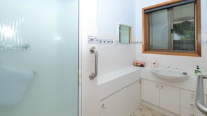 Shower, hair dryer, towels, soap