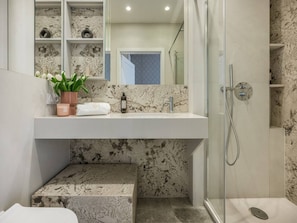 Hair dryer, towels, soap, toilet paper