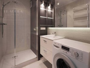 Ein modernes Badezimmer mit Duschkabine aus Glas, einer Waschmaschine von Bosch und einem weißen Waschbecken.
