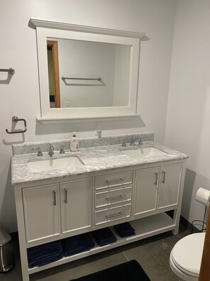 Shower, hair dryer, towels, soap - Lakeside Lodging @ The Plaza
Cozy 2 Bed- 2 Bath Nestled near the Lake Region (Devils Lake)