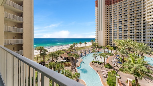 A resort with a pool, beach, and ocean view. - Waterfront condo w/ pool & beach access (Panama City Beach)