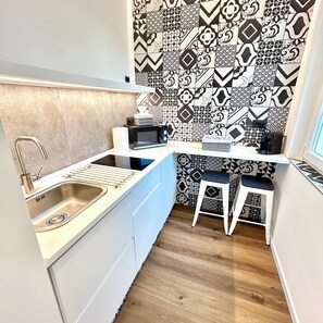 Mikrobølgeovn, ovn og kokeplater