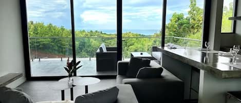 Villa Deluxe, vue océan | Coin séjour