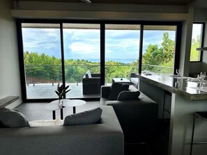 Deluxe Villa, Ocean View | Living area