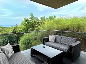 Deluxe Studio Suite, Partial Ocean View | Terrace/patio