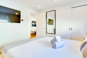 1 bedroom, premium bedding, desk, laptop workspace - Your DC Home Base Apartments (Arlington)