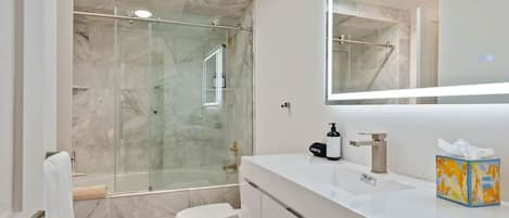 Hair dryer, towels, soap, shampoo