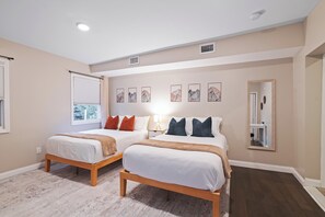 4 bedrooms, desk, iron/ironing board, travel cot