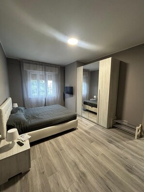 1 bedroom, desk, iron/ironing board, travel cot