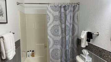 Hair dryer, towels, soap, shampoo