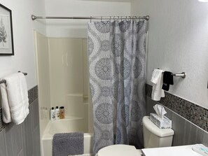 Hair dryer, towels, soap, shampoo