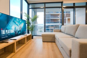 TV, offices - City Serenity: 2BR Apt with Pool, Gym, Steam&Sauna (Adelaide)