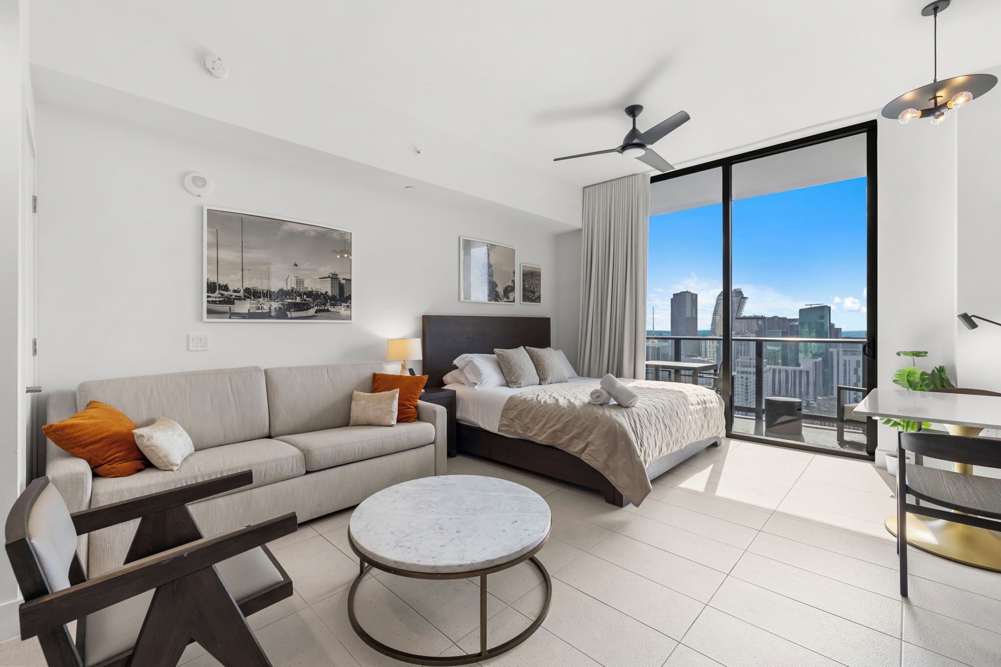 Luxury Studio Suite, 1 Bedroom, City View | Living area | 50-inch Smart TV with cable channels