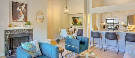 TV, fireplace, books