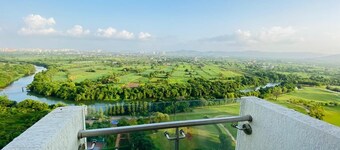 Luxury 22nd-Floor Studio with Golf, River & Skyline Views in Pune
