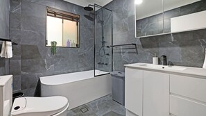 Shower, hair dryer, towels