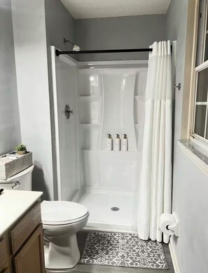 Hair dryer, towels, soap, shampoo