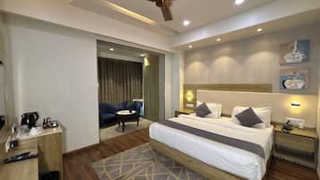 Junior Suite | In-room safe, desk, laptop workspace, iron/ironing board