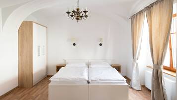 Quartos à prova de som, Wi-Fi de cortesia, roupa de cama