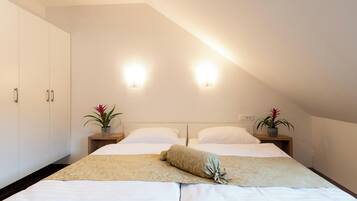 Quartos à prova de som, Wi-Fi de cortesia, roupa de cama