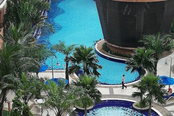 3 outdoor pools, open 6:00 AM to 9:00 AM, pool umbrellas, pool loungers