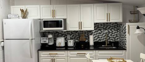 Fridge, microwave, coffee/tea maker, electric kettle